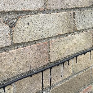 damaged brick wall